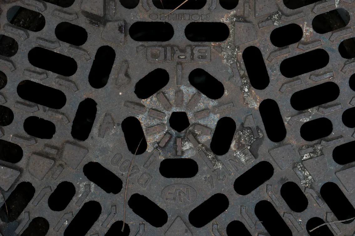 Cast iron drain cover near a proposed house extension